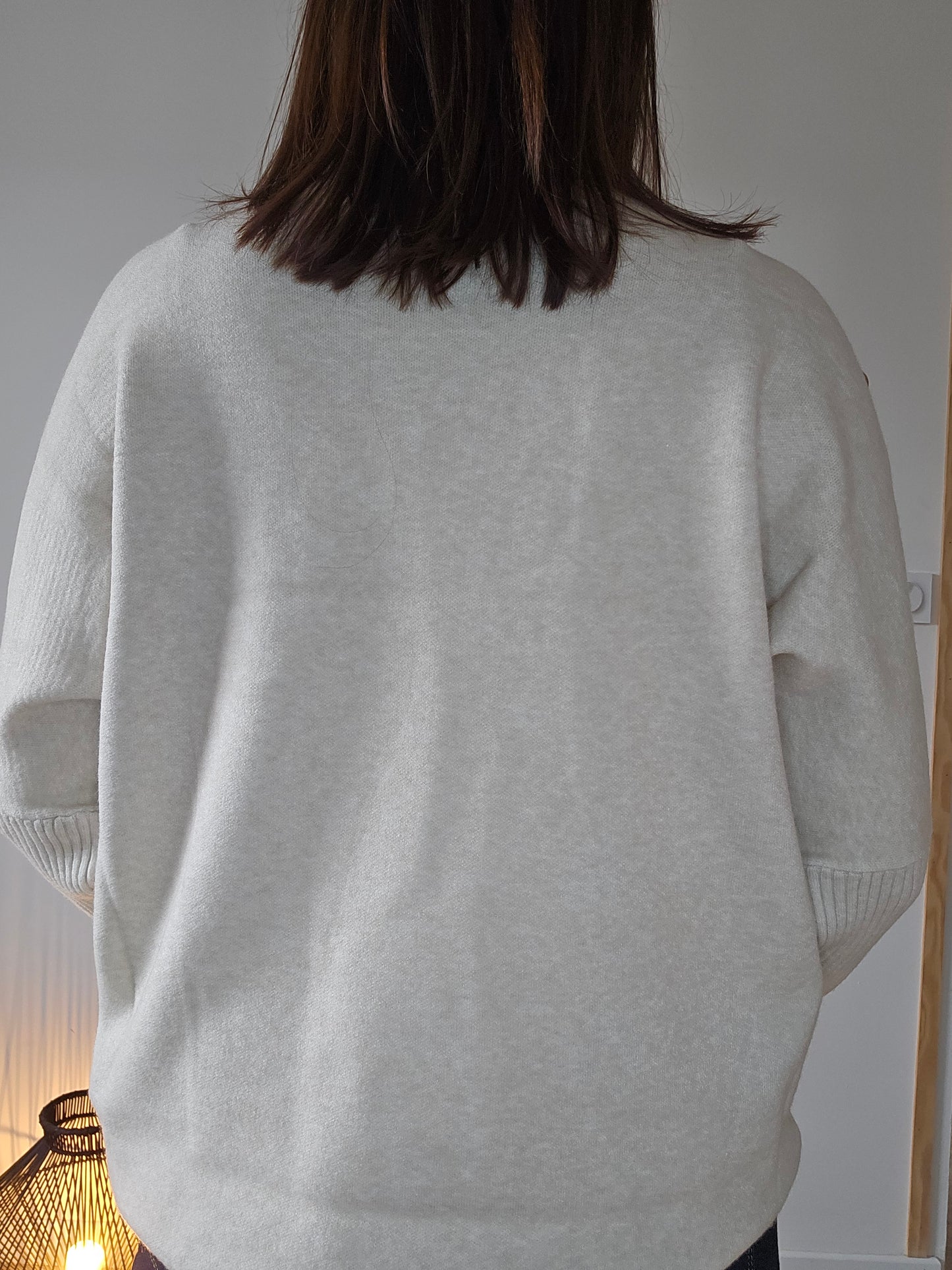 Pull ample, boutons épaules